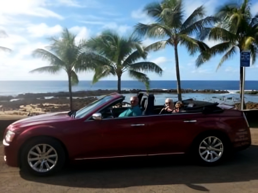 Red convertible at Shark's Cove